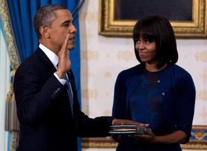 В своей присяге Барак Обама похвалил прическу жены Фото